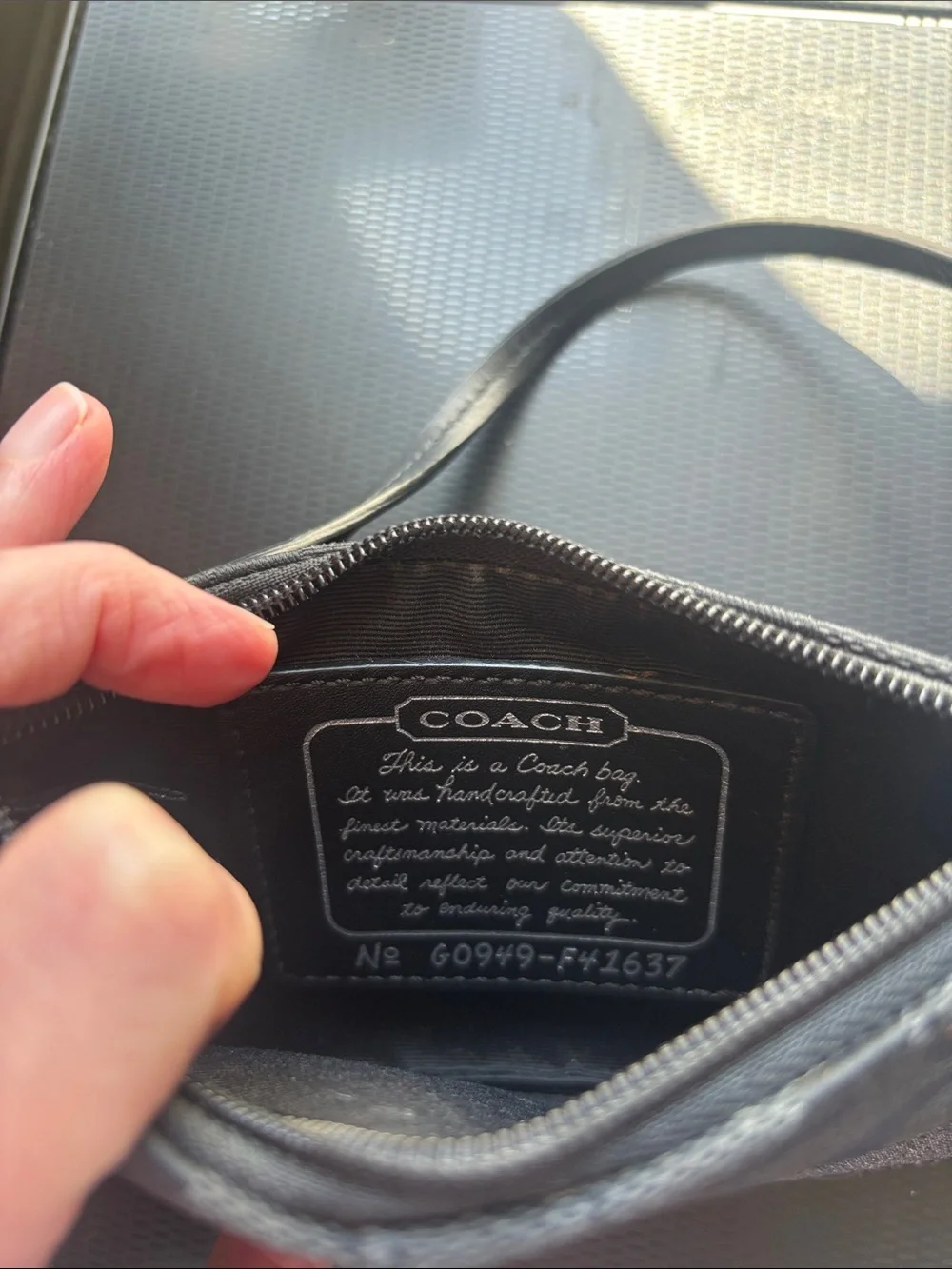 Coach Black Signature Wristlet with Gunmetal Accent